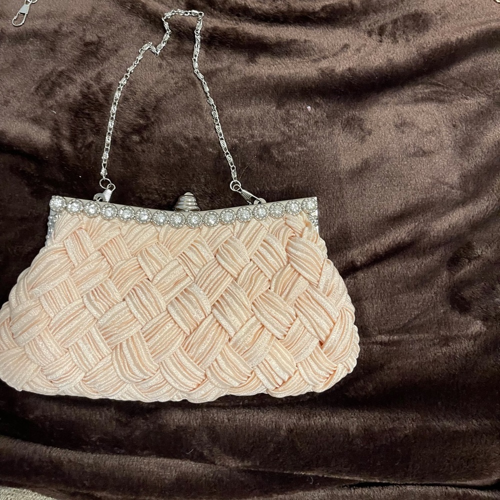 Pink satin clutch